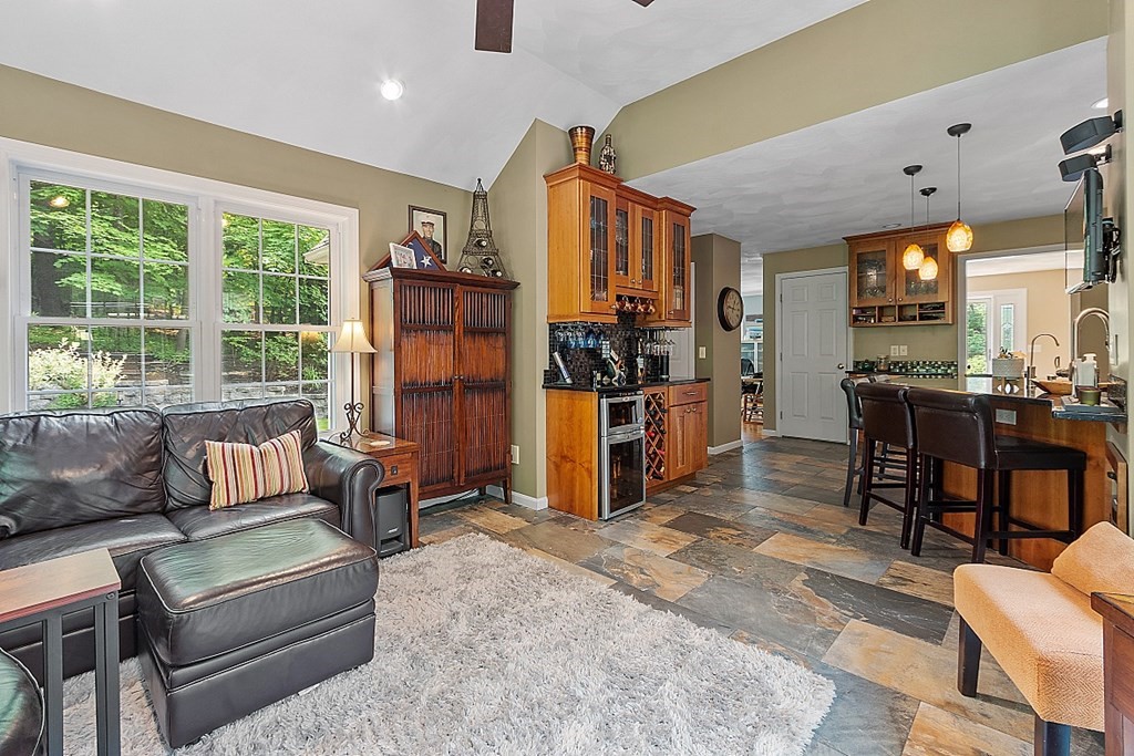 55 Rowley Hill Road Sterling, MA 01564 - Photo 13 of 42 a living room with furniture and a large window