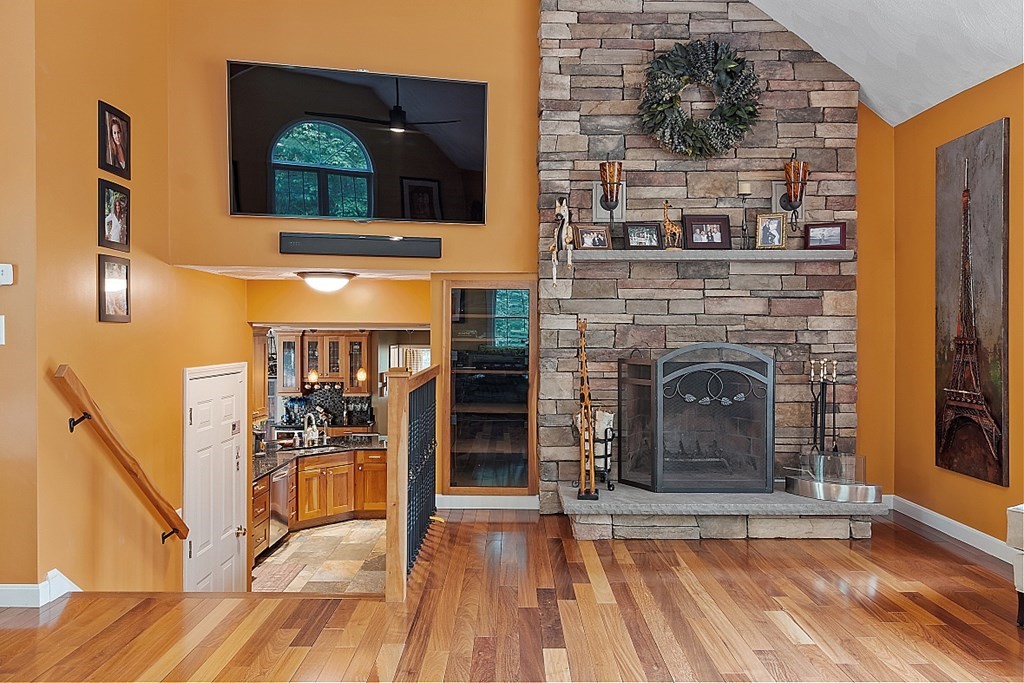 55 Rowley Hill Road Sterling, MA 01564 - Photo 17 of 42 a view of a livingroom with a fireplace and furniture