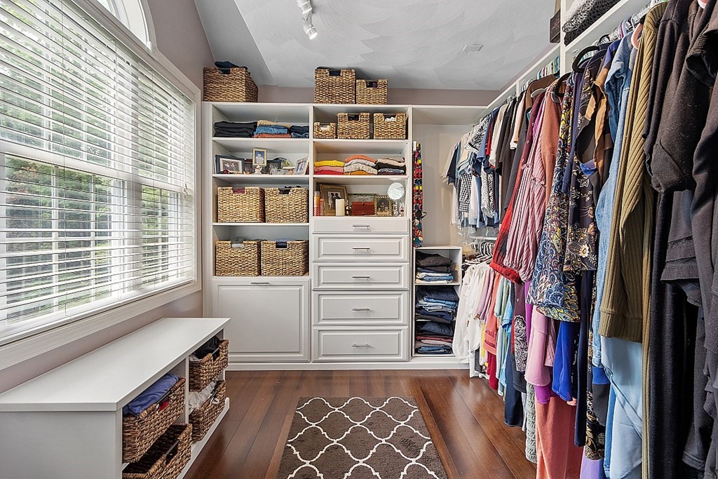 55 Rowley Hill Road Sterling, MA 01564 - Photo 22 of 42 a view of walk in closet with clothes and shoes