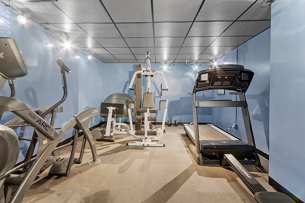 55 Rowley Hill Road Sterling, MA 01564 - Photo 29 of 42 a view of a room with gym equipment