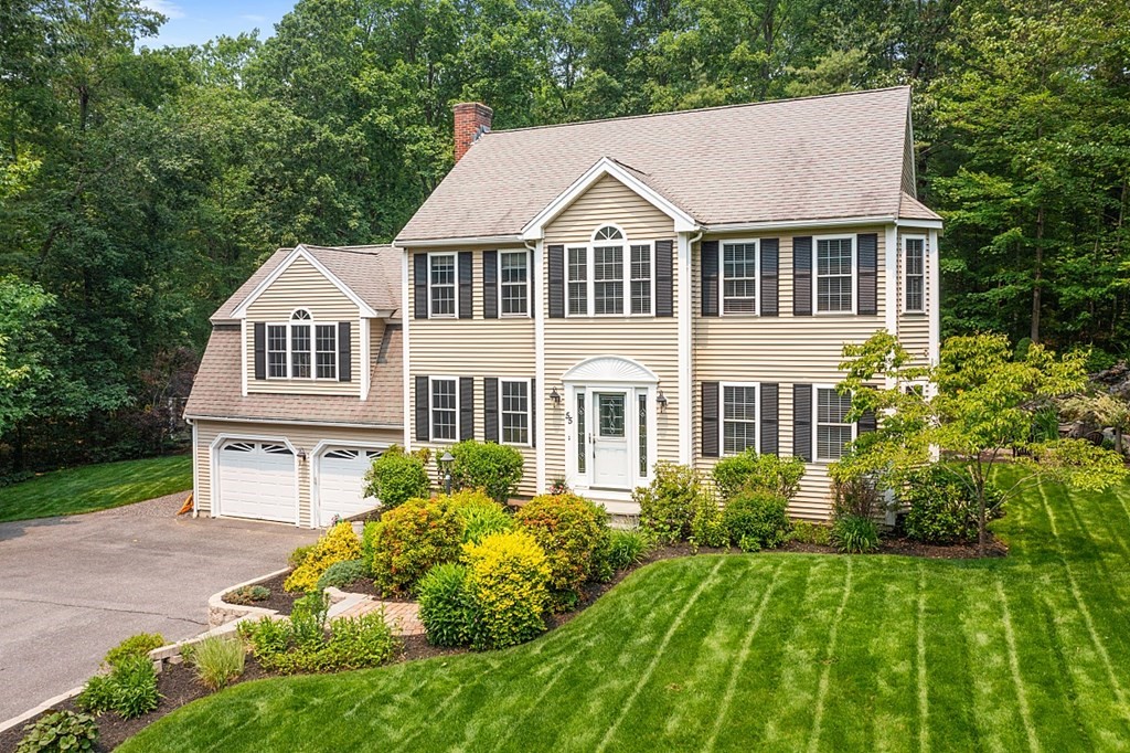 55 Rowley Hill Road Sterling, MA 01564 - Photo 3 of 42 a front view of a house with a yard