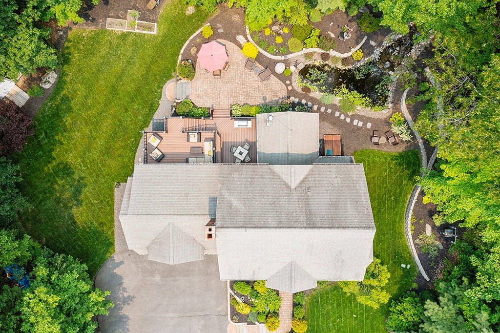 55 Rowley Hill Road Sterling, MA 01564 - Photo 31 of 42 an aerial view of a house with swimming pool and large trees