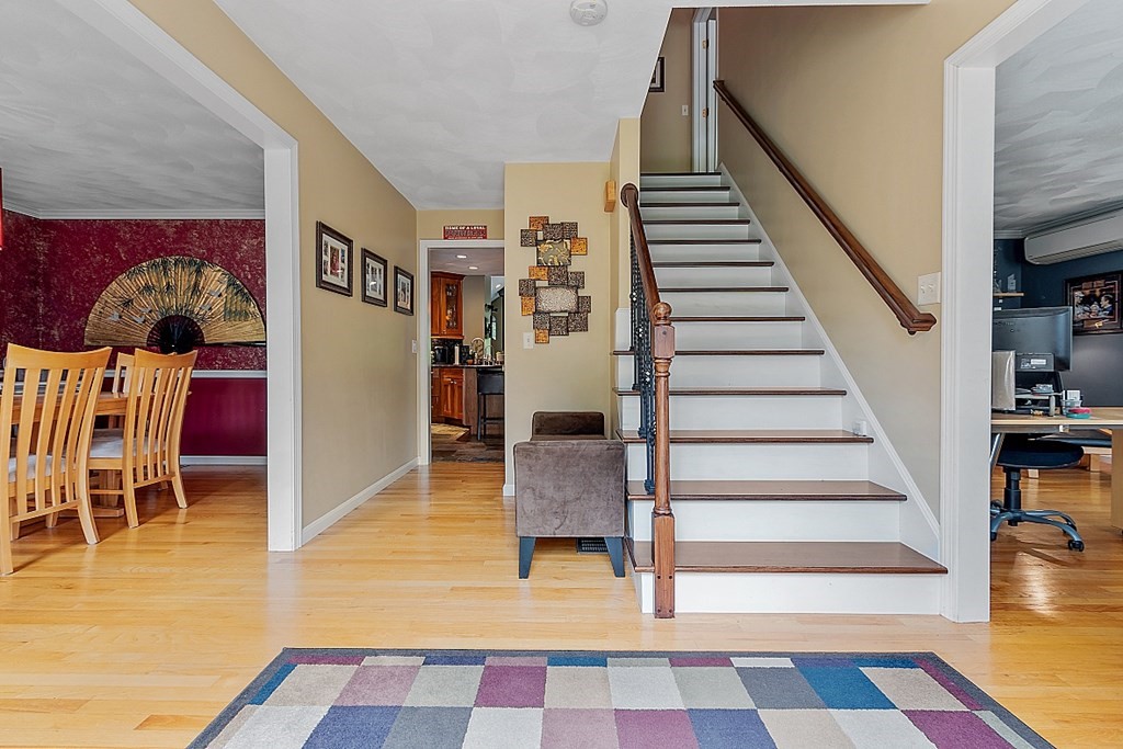 55 Rowley Hill Road Sterling, MA 01564 - Photo 5 of 42 a view of entryway and hall with wooden floor