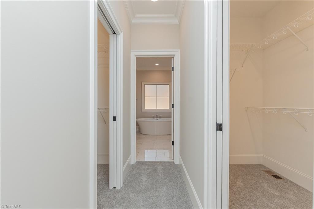 5083 Tower Road Greensboro, NC 27410 - Photo 20 of 50 Primary Closets / Bath Entrance