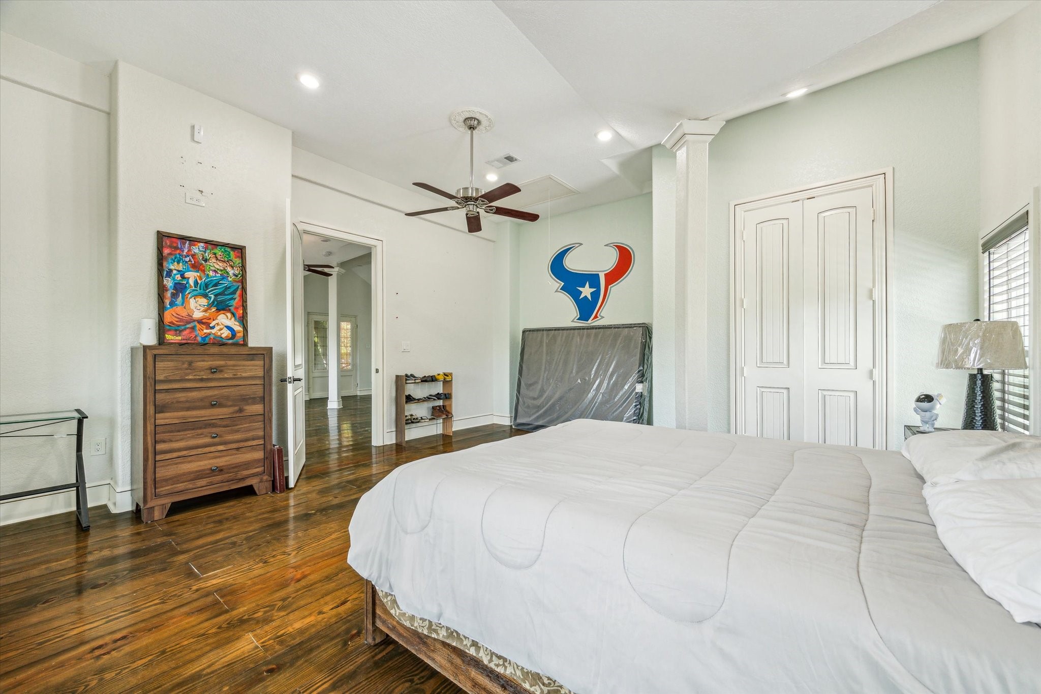 5530 Allen-Genoa Road Houston, TX 77504 - Photo 13 of 19 a bedroom with a bed and a view of kitchen