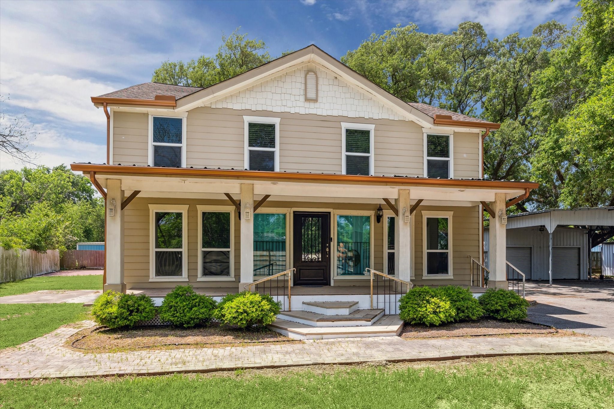 5530 Allen-Genoa Road Houston, TX 77504 - Photo 2 of 19 front view of a house and a yard