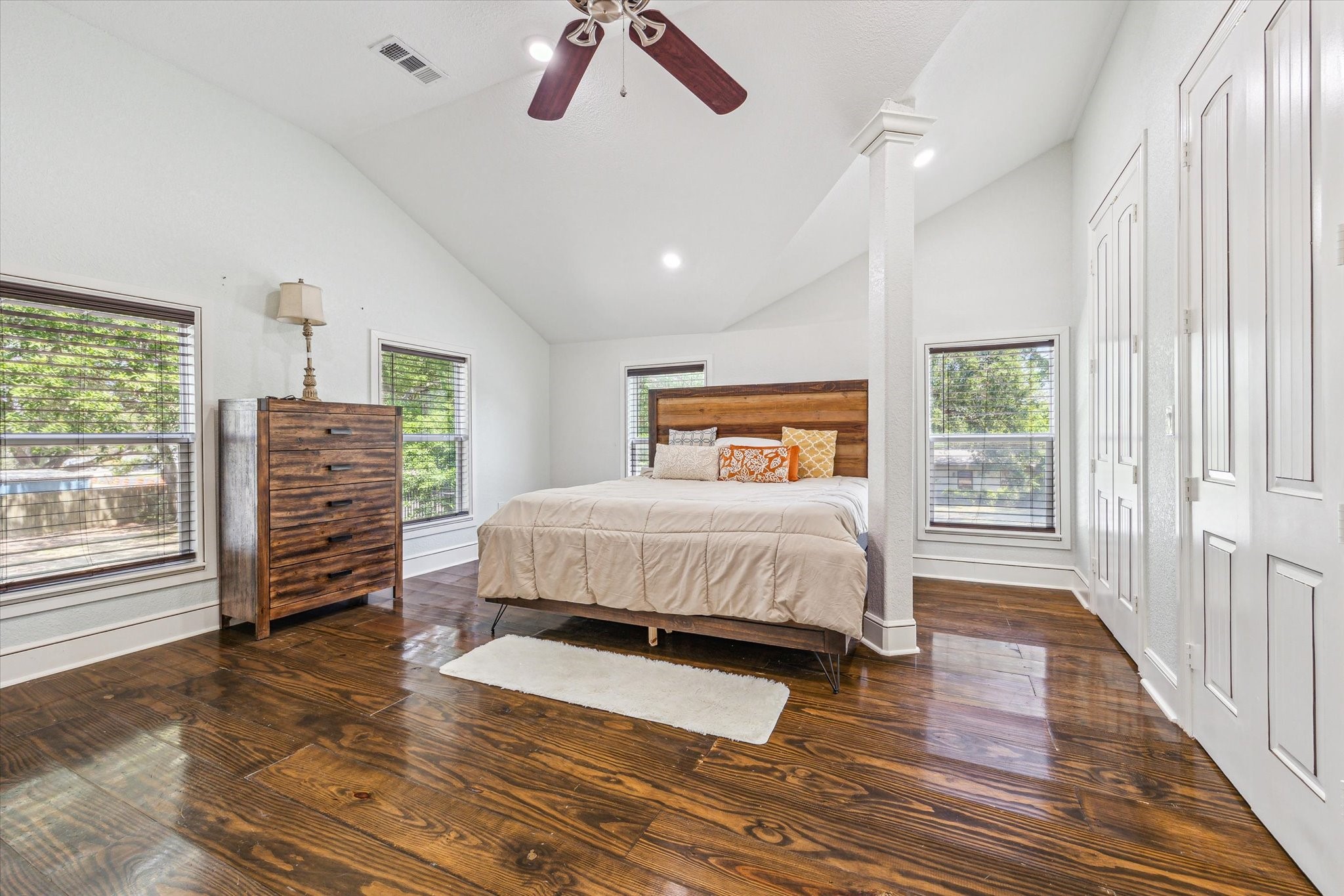 5530 Allen-Genoa Road Houston, TX 77504 - Photo 9 of 19 a bedroom with a bed and wooden floor