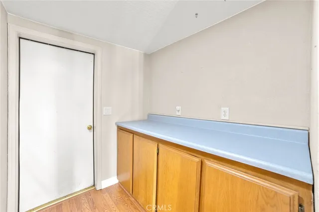 a view of a balcony with yard