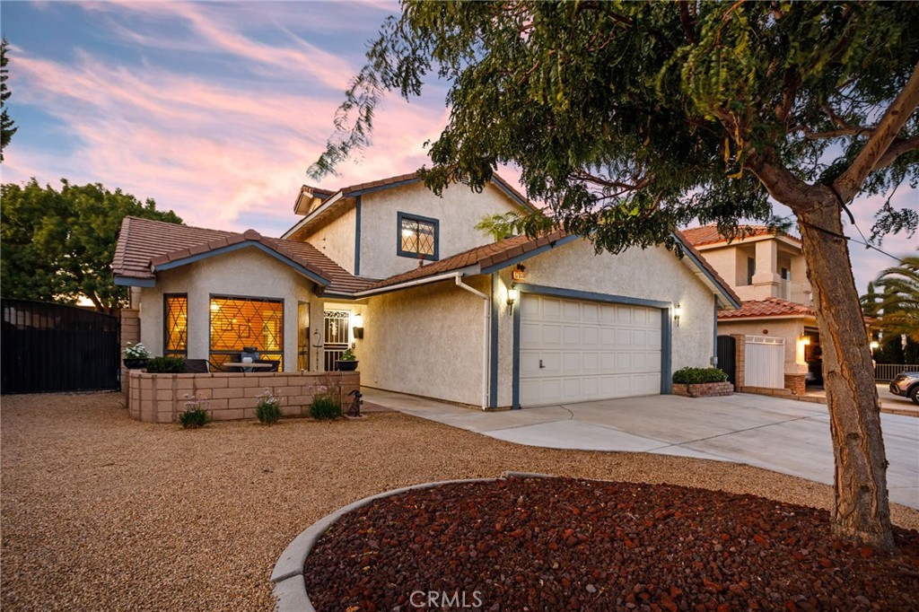 17800 Rancho Bonita Road Victorville, CA 92395 - Photo 2 of 52 a view of a house with a yard