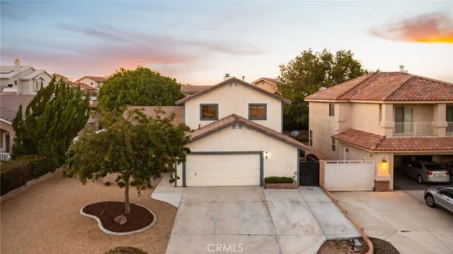 a view of a lake with boats and trees