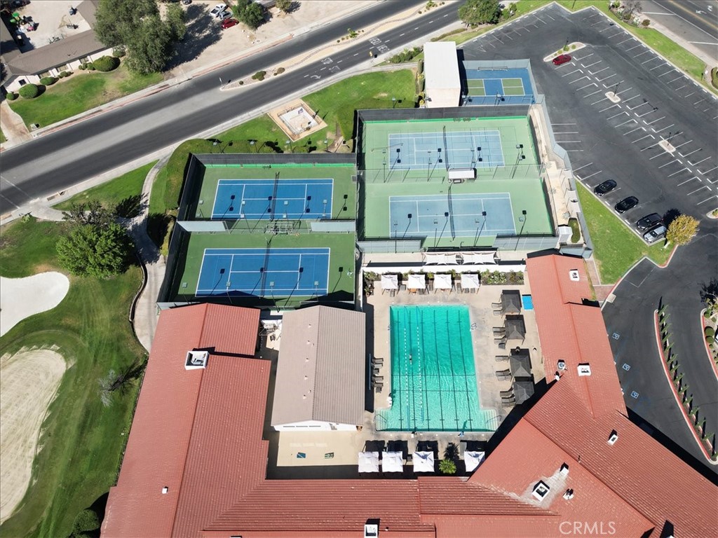 17800 Rancho Bonita Road Victorville, CA 92395 - Photo 42 of 52 an aerial view of a house with a garden and a garage