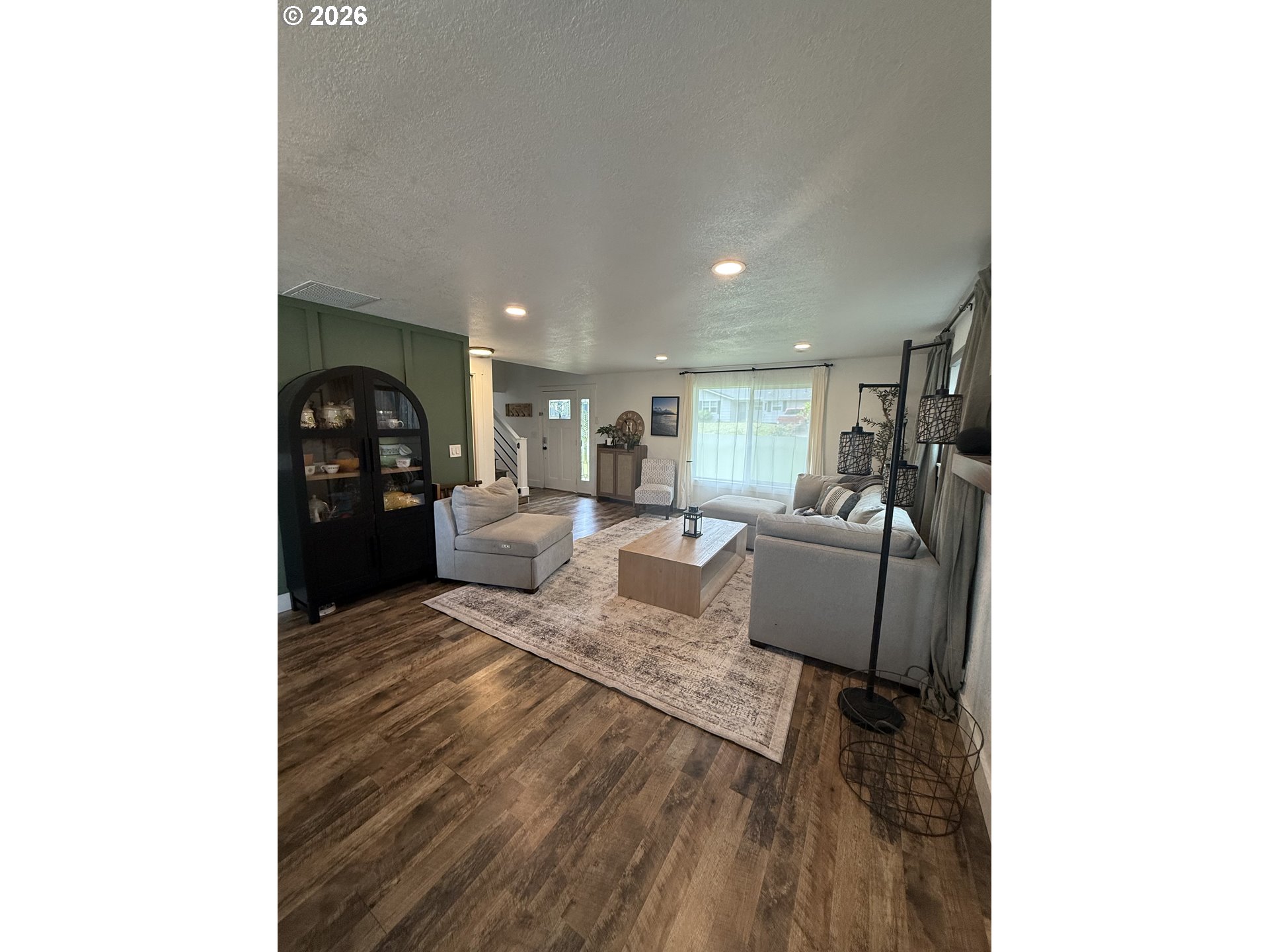 6974 Glacier Drive Springfield, OR 97478 - Photo 9 of 37 a living room with furniture and a table
