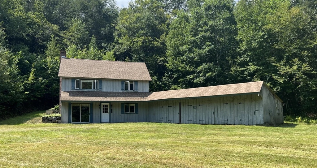 a view of a house with a swimming pool