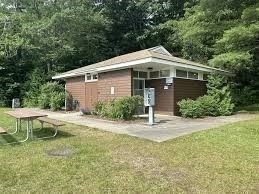 12 Sears Road Sandisfield, MA 01255 - Photo 21 of 22 a front view of a house with a yard and porch