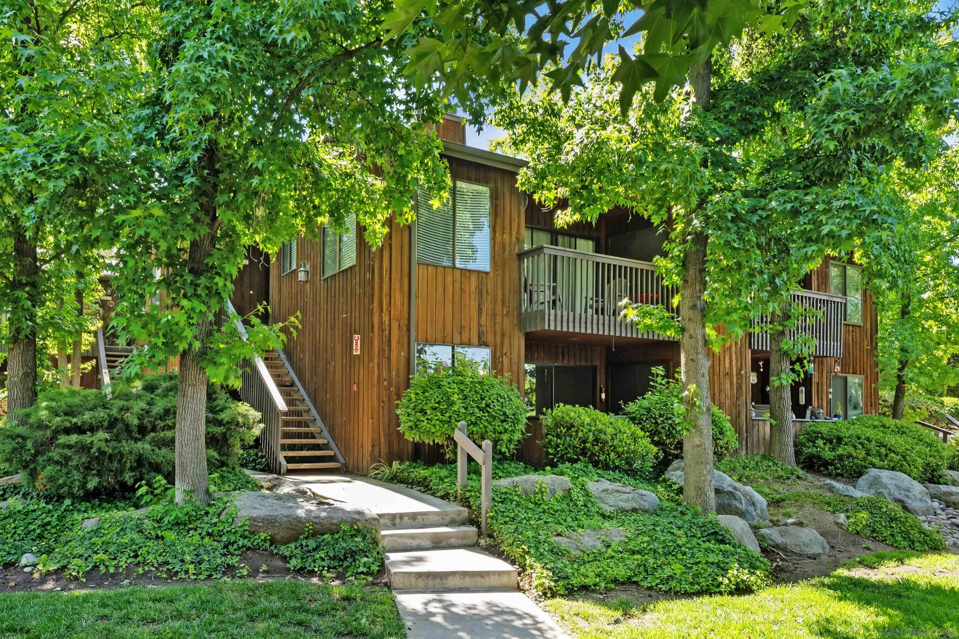 a house view with a garden space