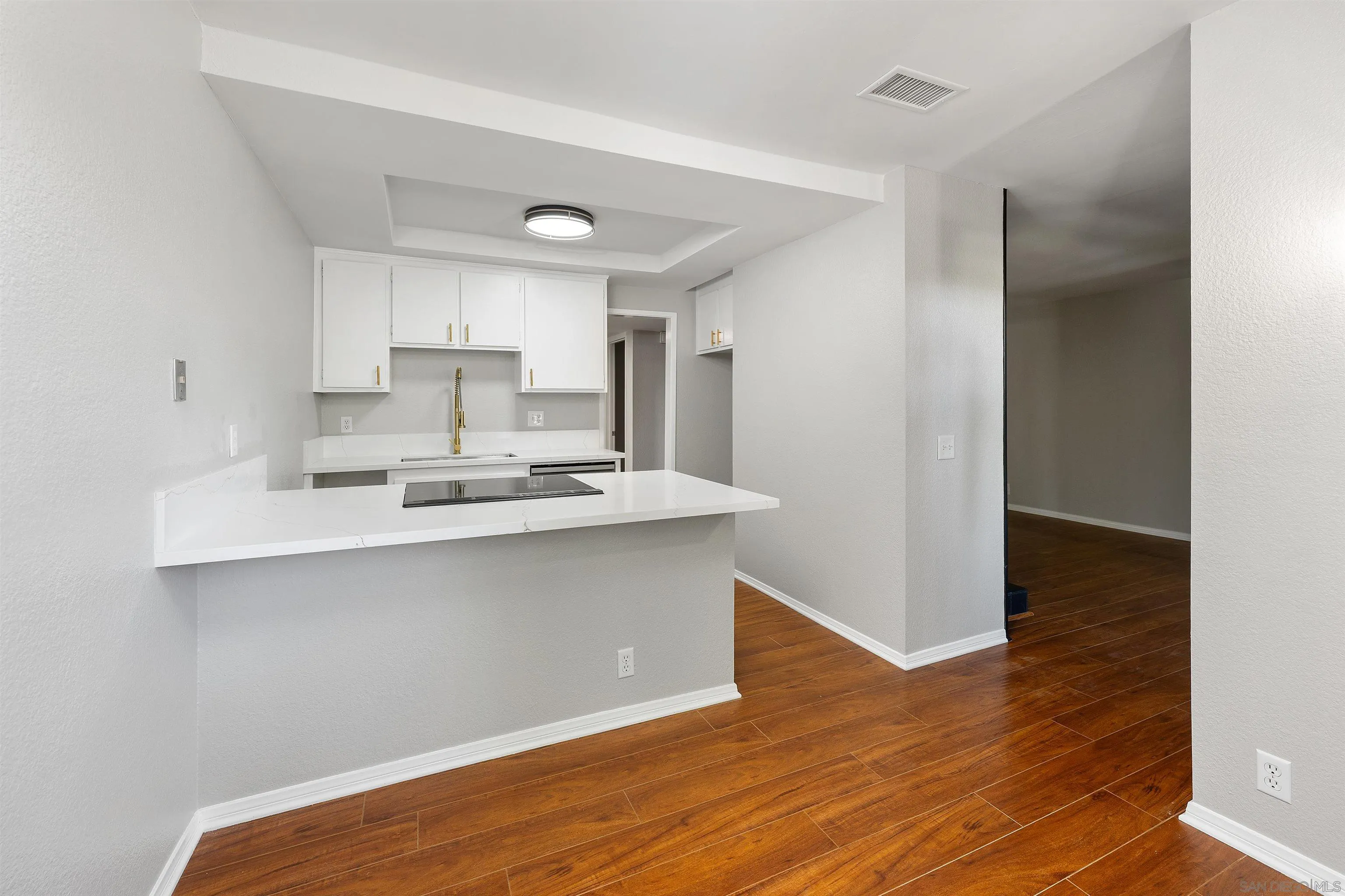 2157 Arnold Way, Unit 312 Alpine, CA 91901 - Photo 11 of 26 a kitchen with stainless steel appliances refrigerator sink and cabinets