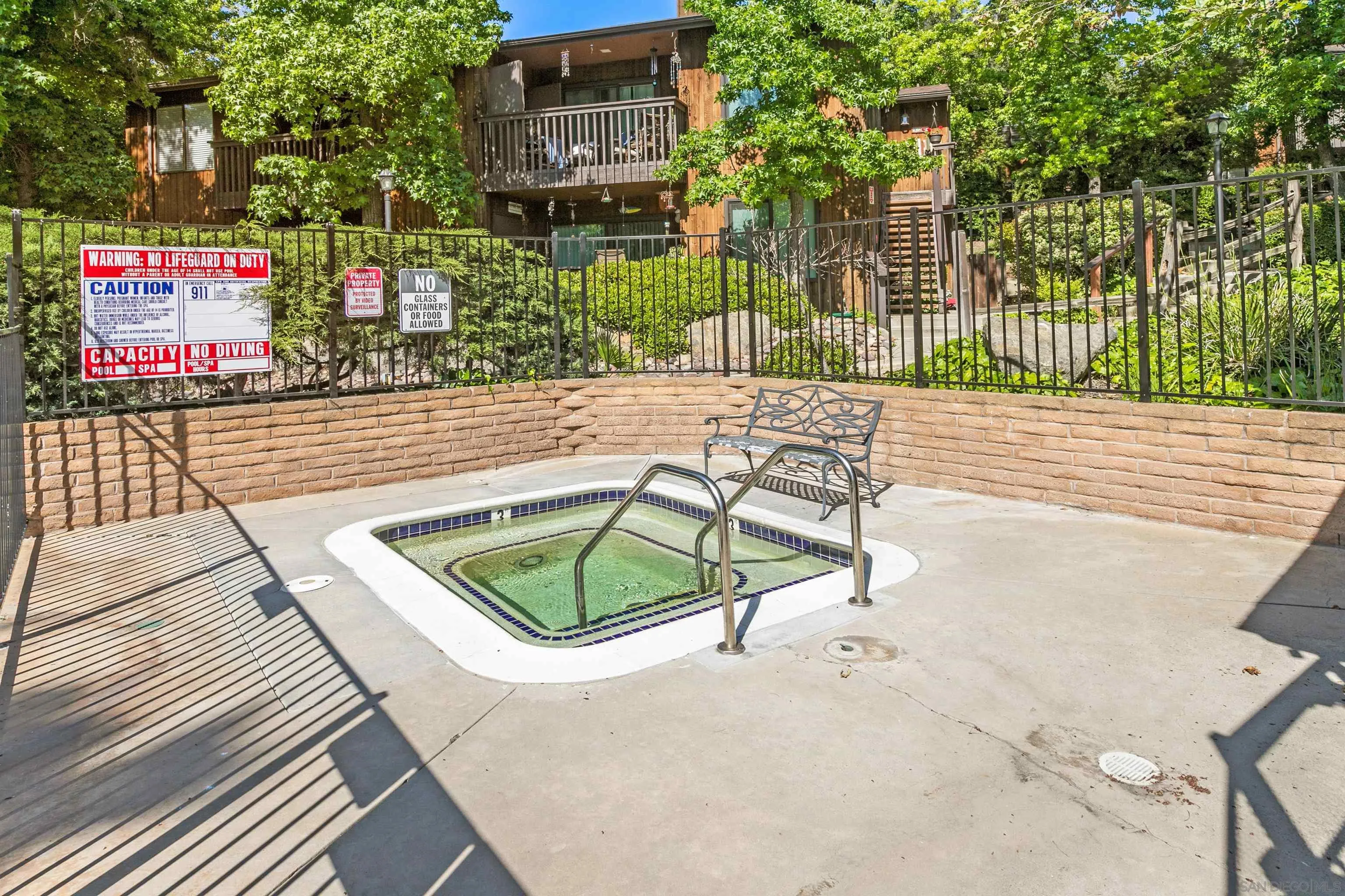 2157 Arnold Way, Unit 312 Alpine, CA 91901 - Photo 26 of 26 a view of a chairs and table in the patio