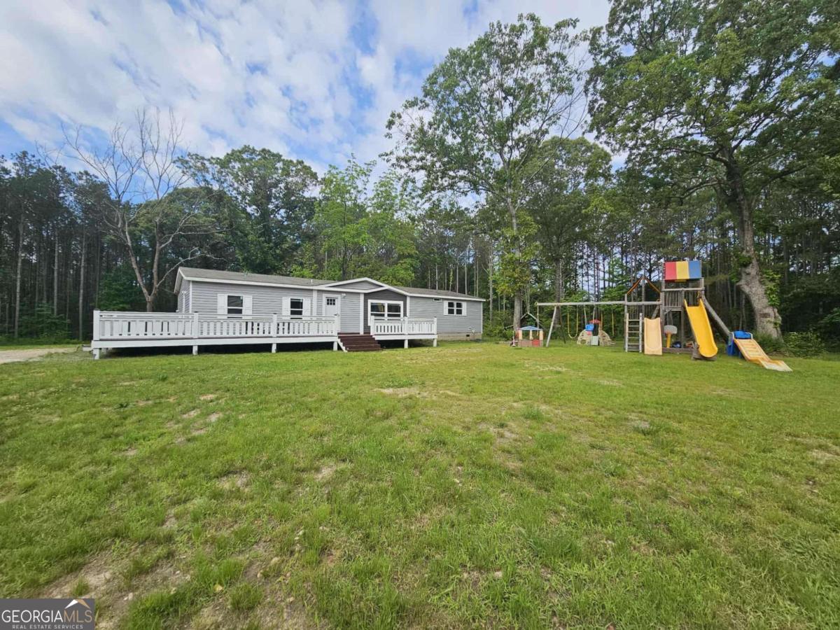 a view of a house with a park