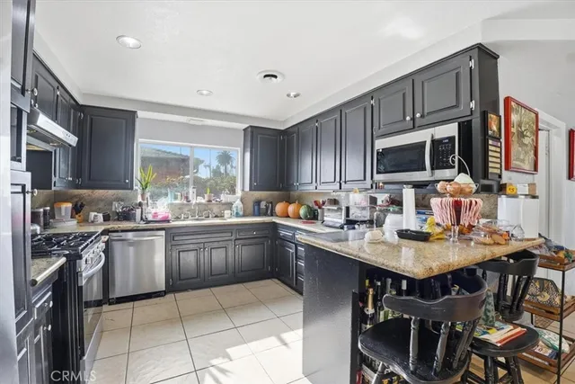 a bathroom with a sink vanity and a mirror