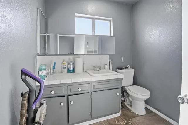 a room with cabinets and gym equipment