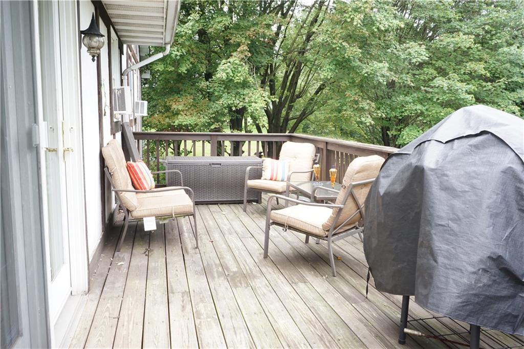 289 Hellein School Road Acme, PA 15610 - Photo 20 of 25 Upper Deck access from dining room or back yard.