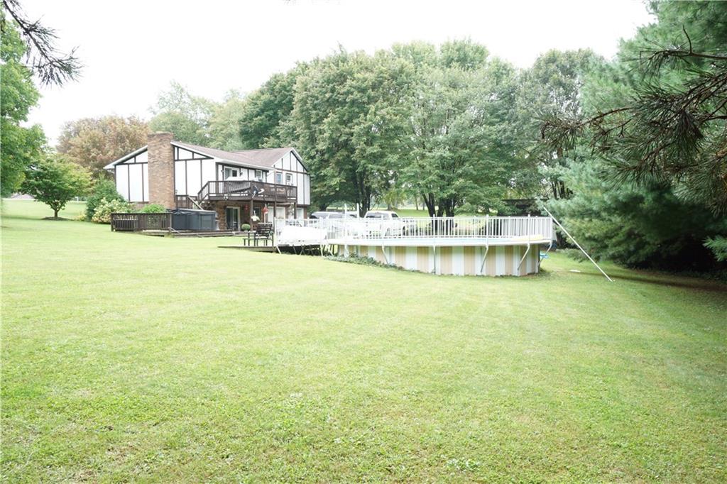 289 Hellein School Road Acme, PA 15610 - Photo 22 of 25 Rear view of home/yard/pool