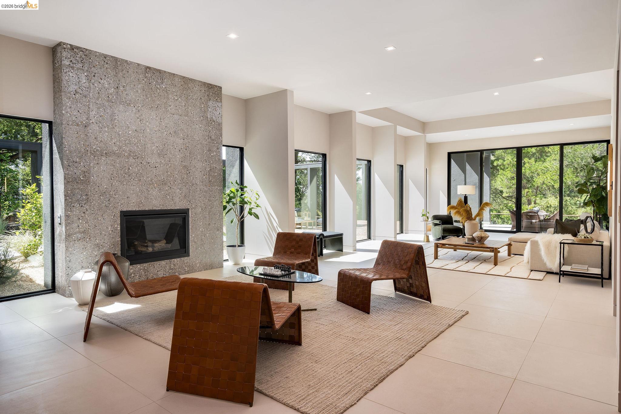 5645 Bacon Road Oakland, CA 94619 - Photo 11 of 60 Living area featuring a large fireplace, recessed lighting, and light tile patterned floors