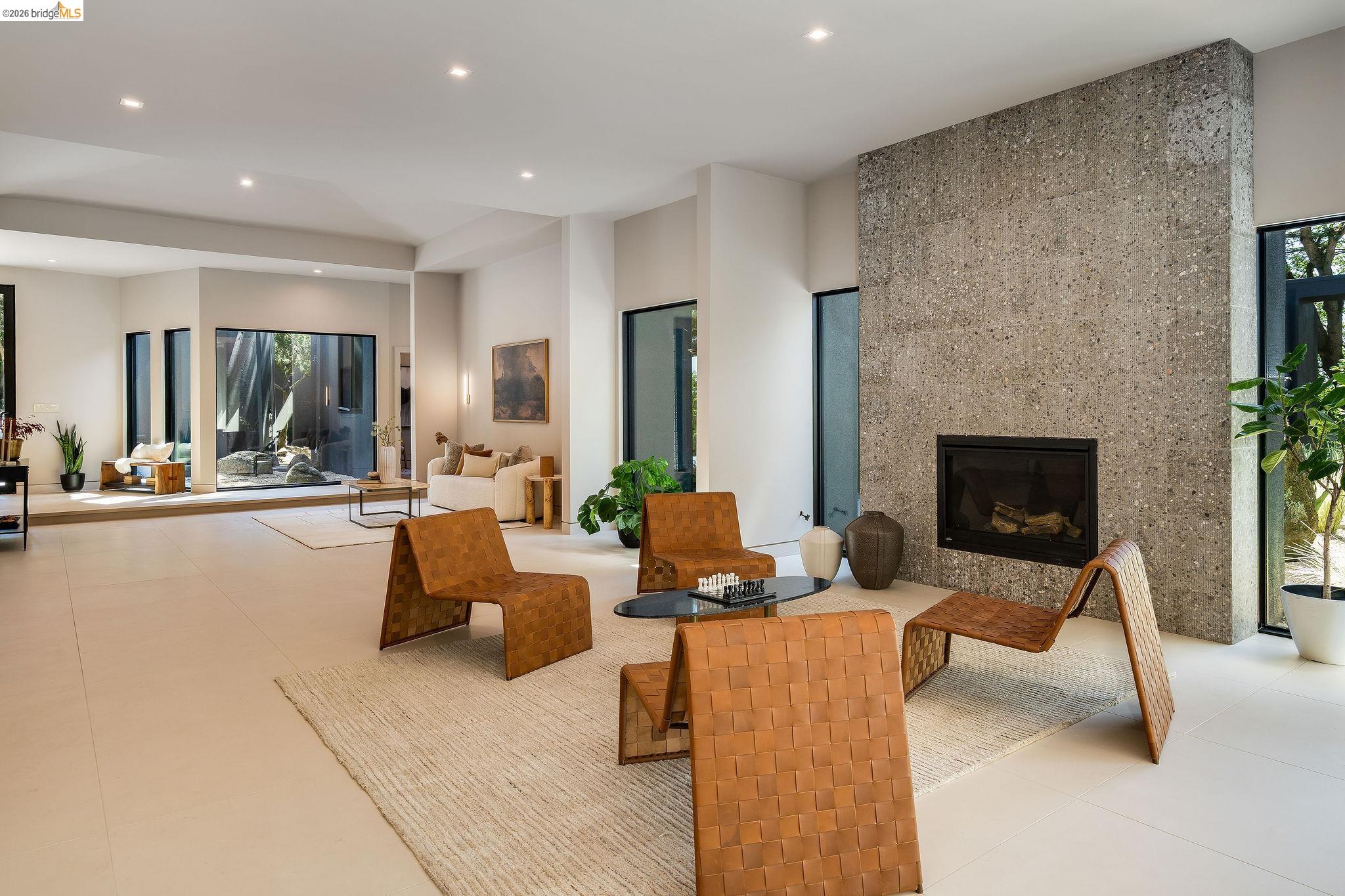 5645 Bacon Road Oakland, CA 94619 - Photo 15 of 60 Living area with a tile fireplace, recessed lighting, and light tile patterned floors
