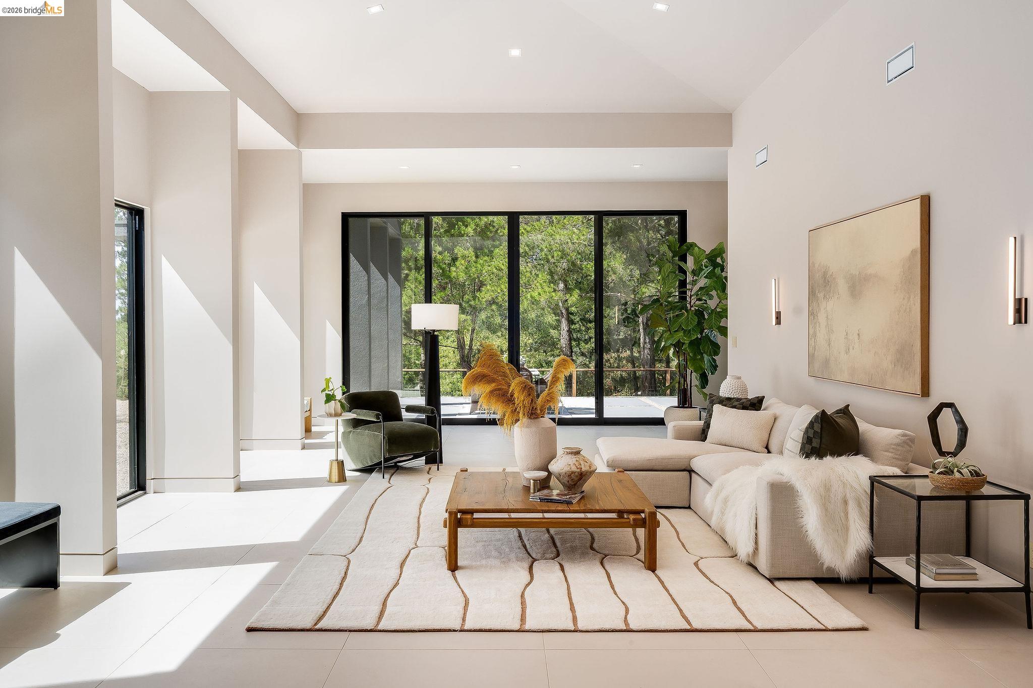5645 Bacon Road Oakland, CA 94619 - Photo 16 of 60 Living area featuring tile patterned floors, recessed lighting, and lofted ceiling