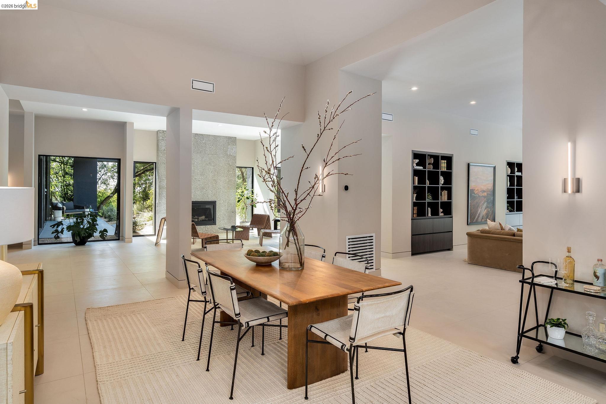 5645 Bacon Road Oakland, CA 94619 - Photo 22 of 60 Dining room featuring recessed lighting and a tile fireplace