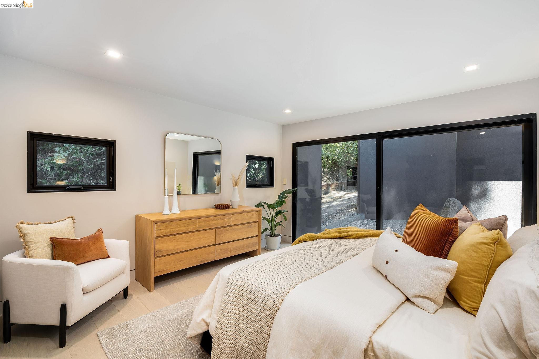 5645 Bacon Road Oakland, CA 94619 - Photo 36 of 60 Bedroom featuring access to outside and recessed lighting