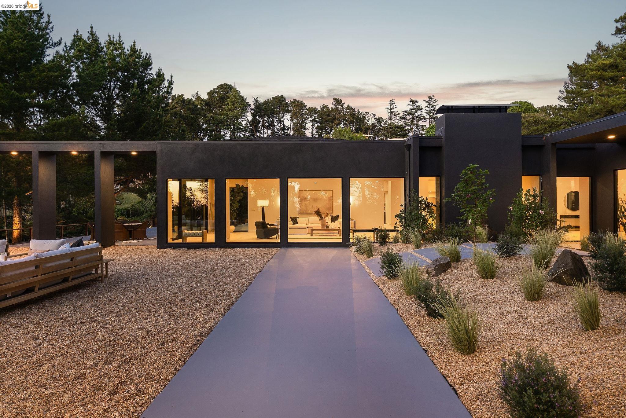 5645 Bacon Road Oakland, CA 94619 - Photo 53 of 60 Rear view of house with a patio area, a chimney, and stucco siding