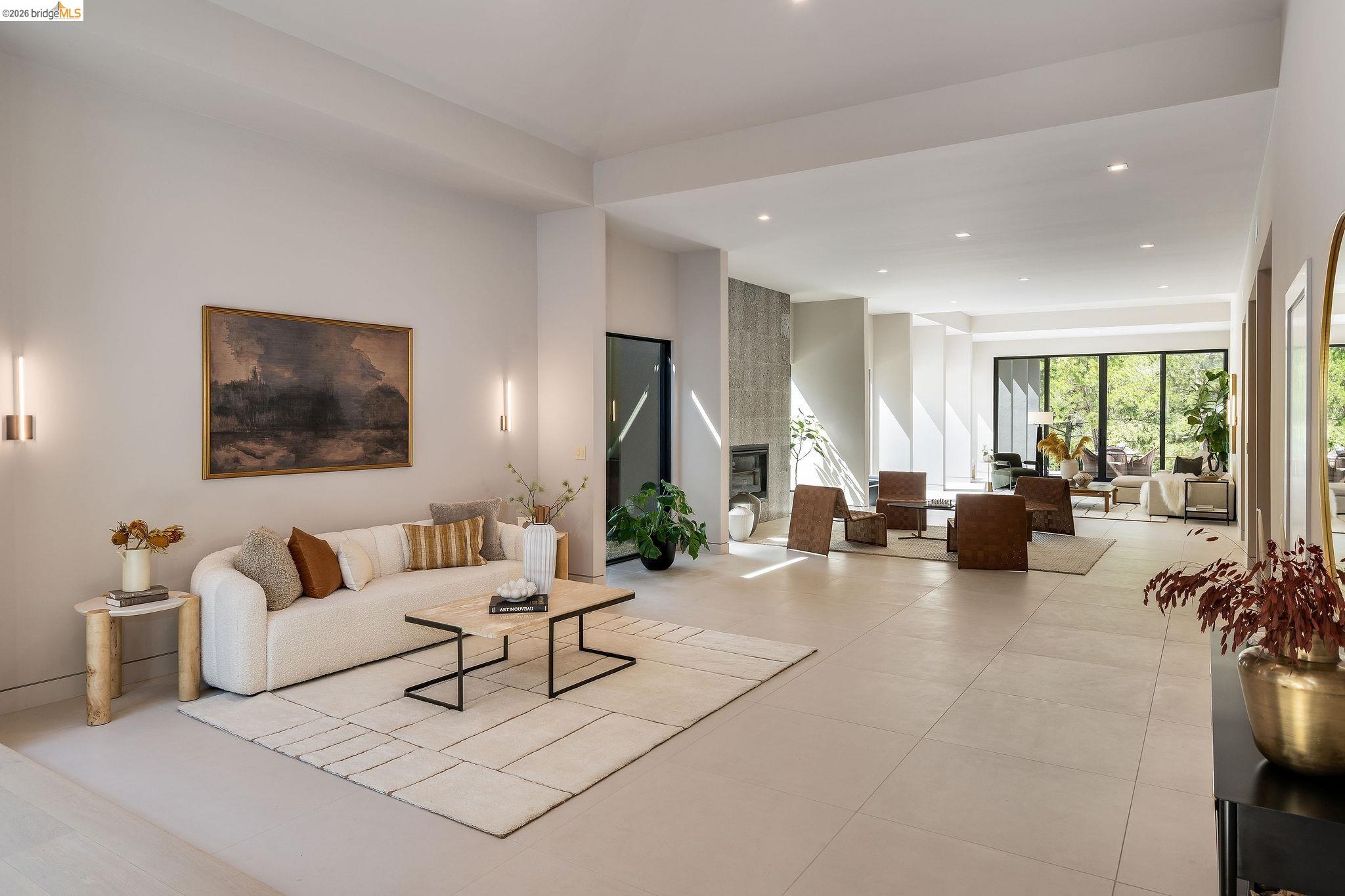 5645 Bacon Road Oakland, CA 94619 - Photo 9 of 60 Living area with recessed lighting, light tile patterned flooring, and a premium fireplace