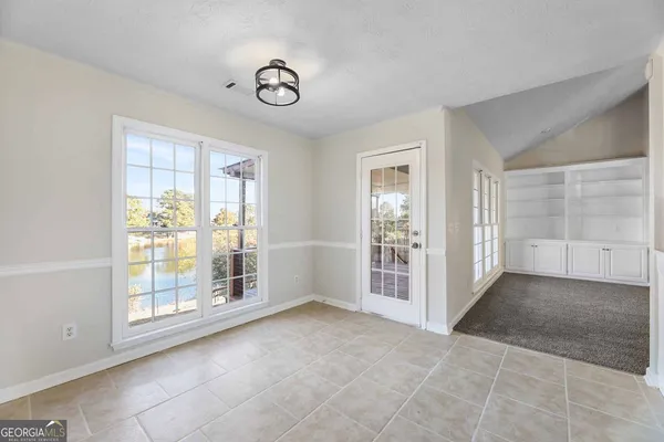 an empty room with windows