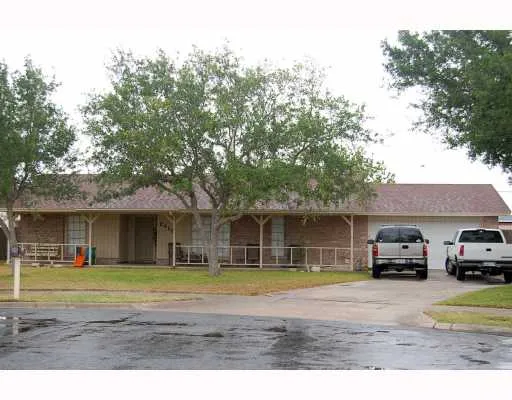 a house view with a garden space