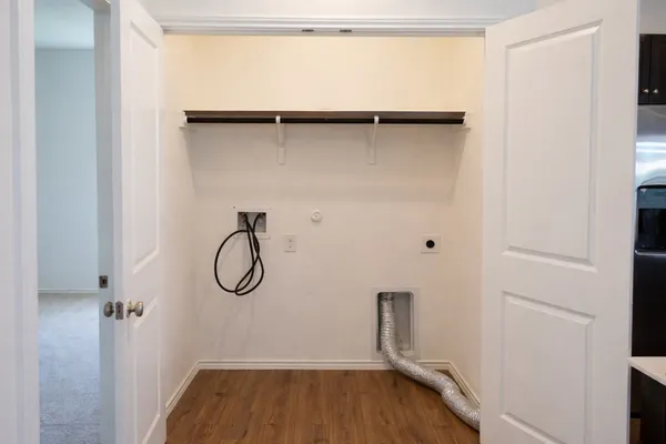 a view of an empty walk in closet