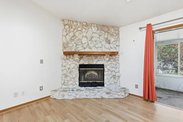 a living room with a fireplace