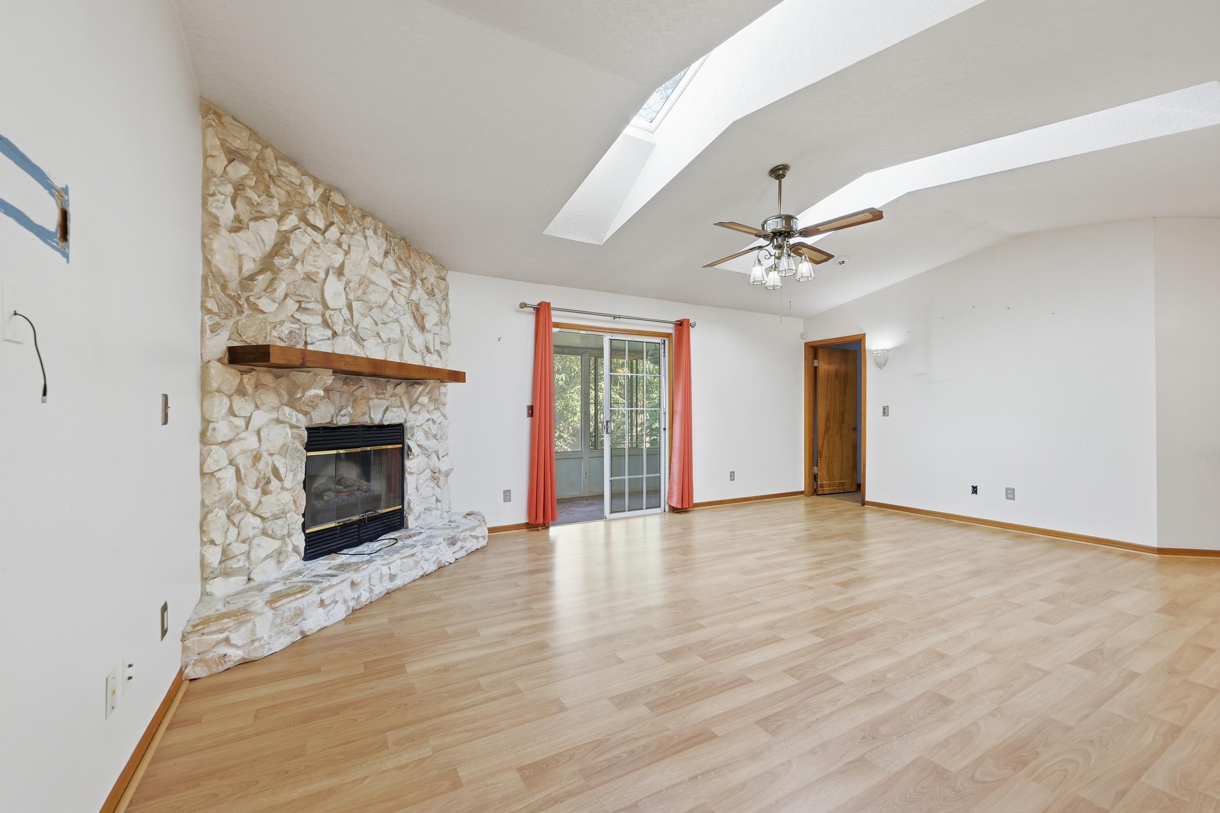115 Segovia Road St. Augustine, FL 32086 - Photo 18 of 48 a view of an empty room with a fireplace