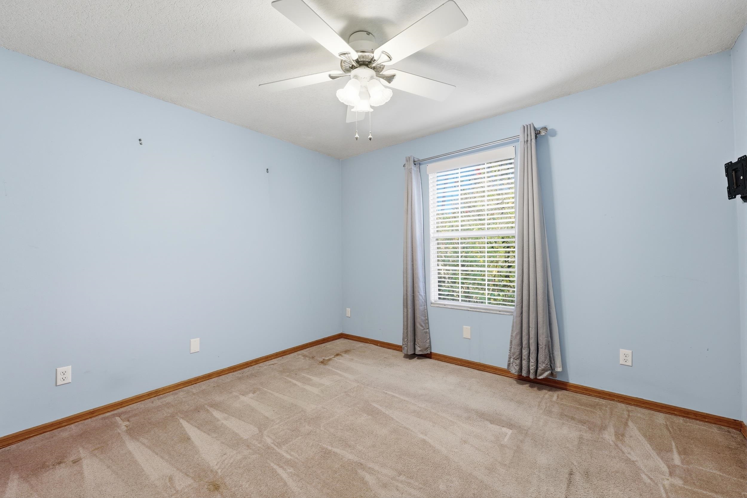 115 Segovia Road St. Augustine, FL 32086 - Photo 30 of 48 a view of an empty room with a window