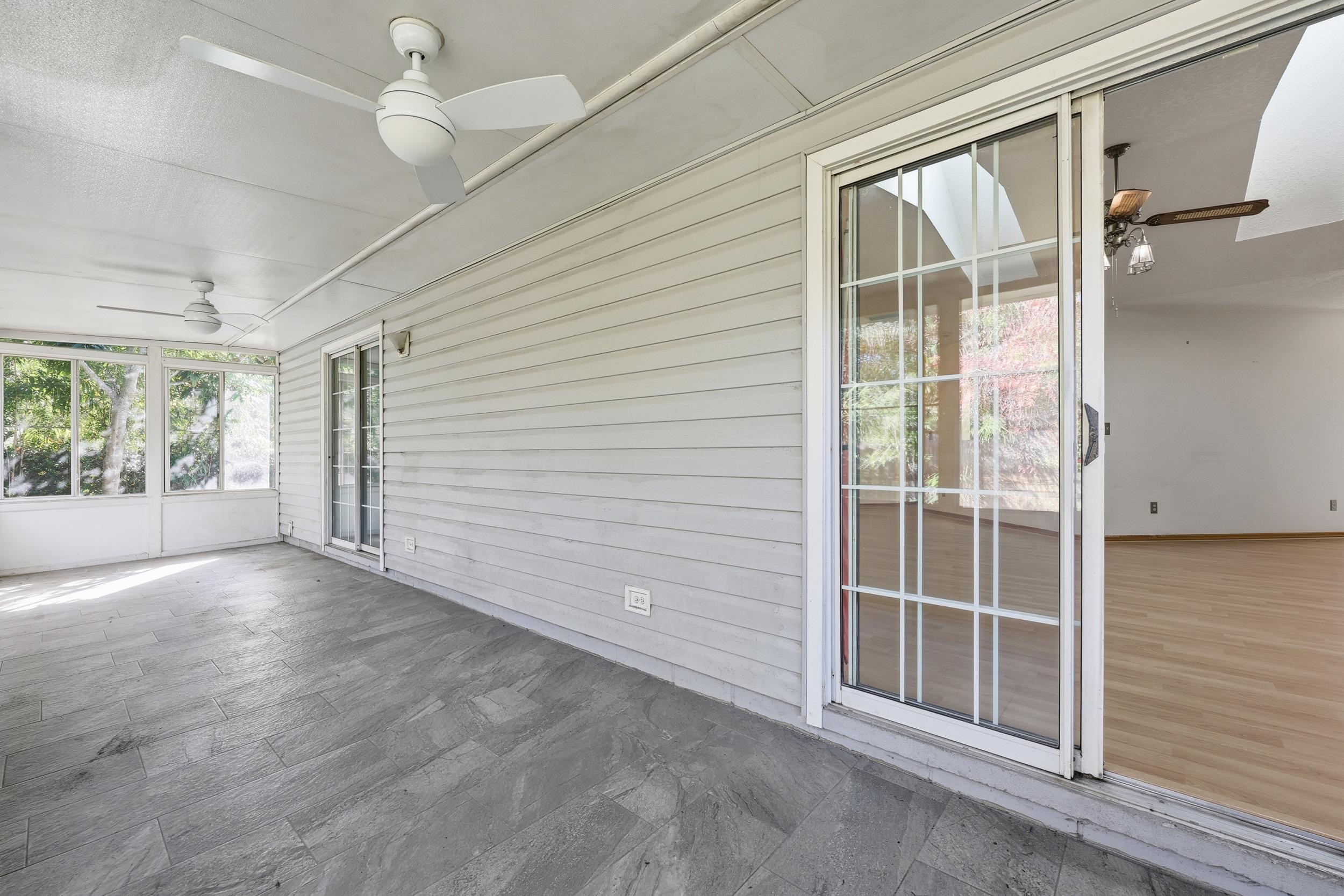 115 Segovia Road St. Augustine, FL 32086 - Photo 32 of 48 Unfurnished sunroom with a ceiling fan