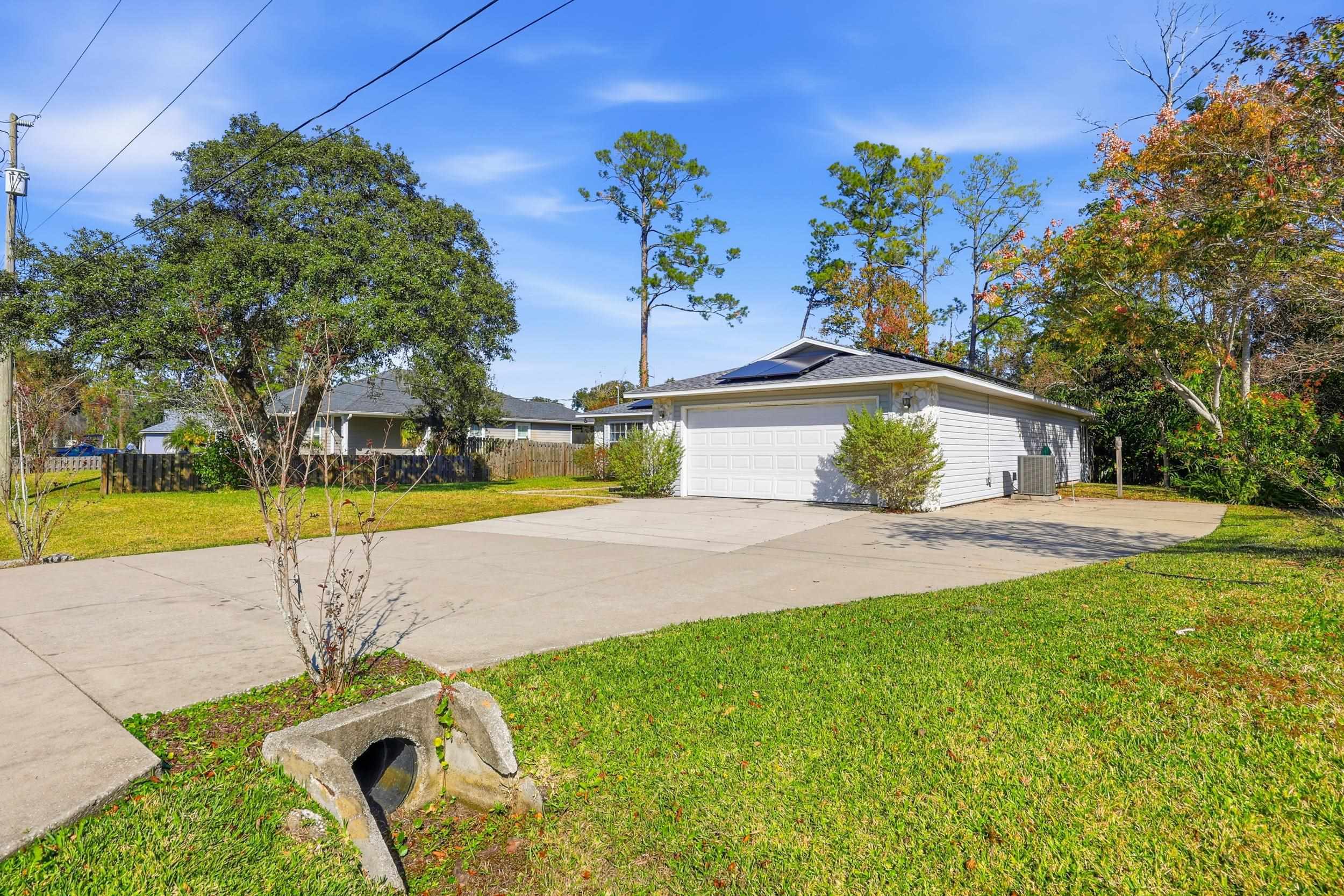 115 Segovia Road St. Augustine, FL 32086 - Photo 36 of 48 a view of a swimming pool with a patio