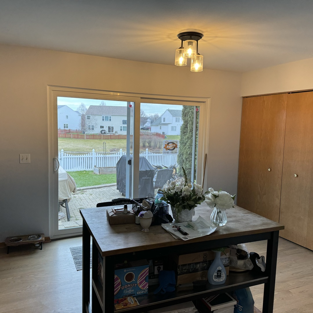 2614 Discovery Drive Plainfield, IL 60586 - Photo 7 of 28 a view of a dining room with furniture window and outside view