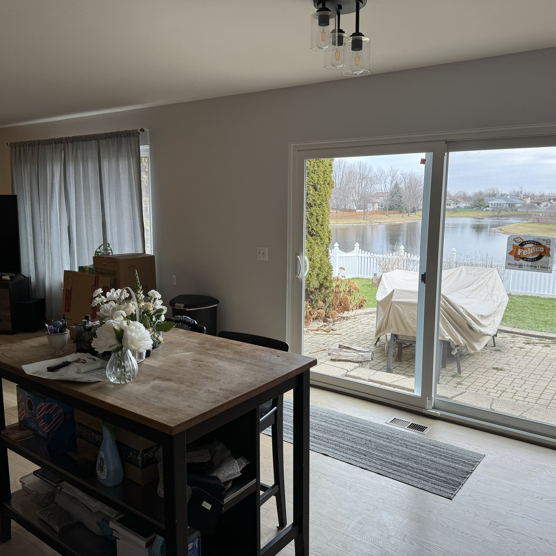 2614 Discovery Drive Plainfield, IL 60586 - Photo 8 of 28 a view of a dining room with furniture window and outside view