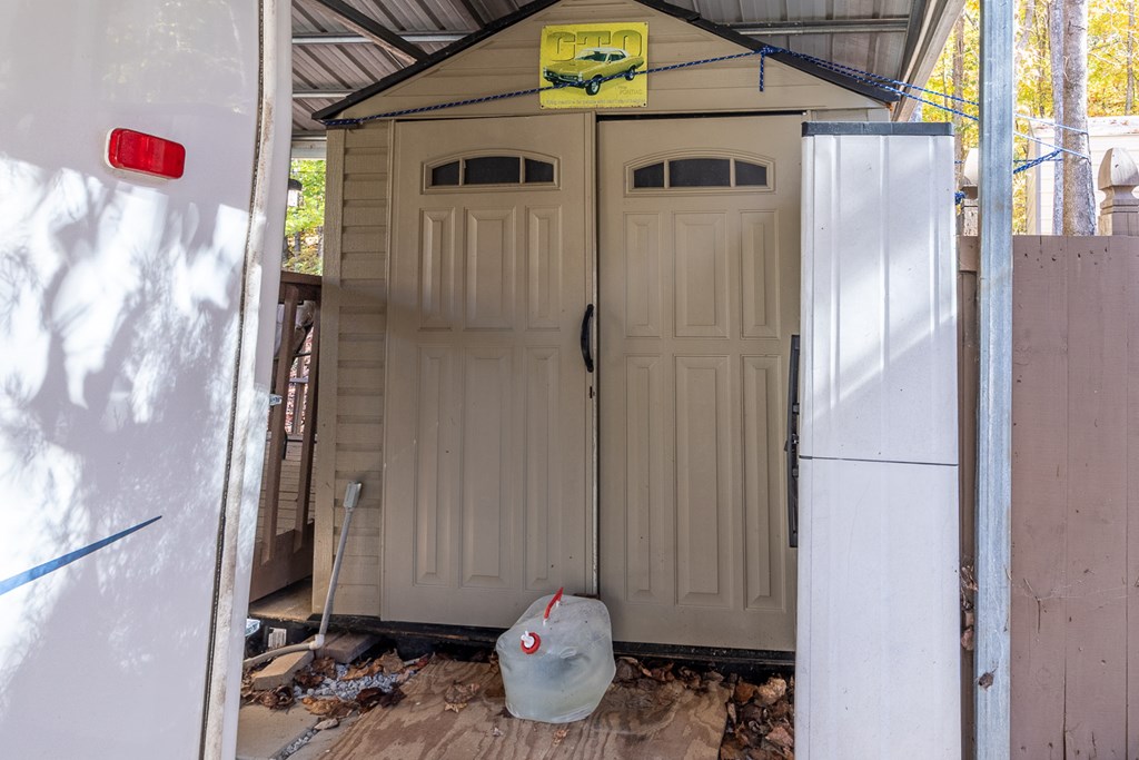 66-186 Peaceful Loop Chatsworth, GA 30705 - Photo 16 of 31 a bathroom with a shower