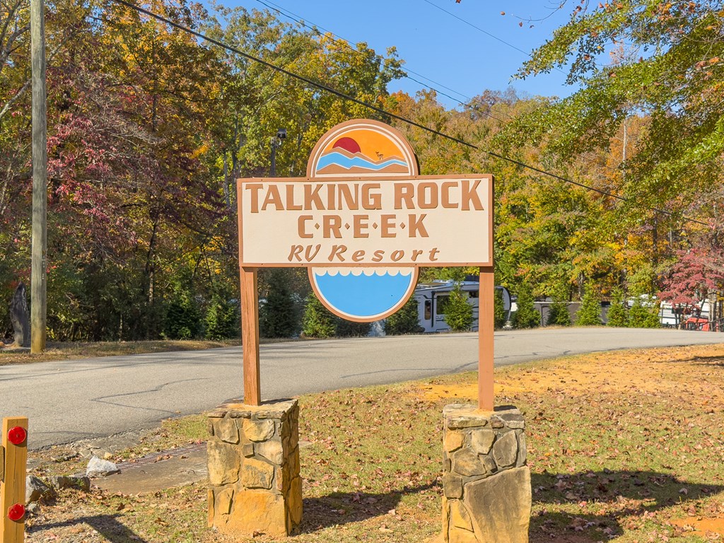 66-186 Peaceful Loop Chatsworth, GA 30705 - Photo 22 of 31 a view of swimming pool with an outdoor space