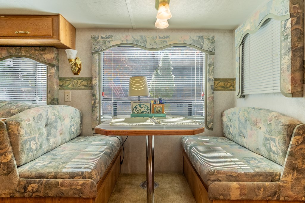 66-186 Peaceful Loop Chatsworth, GA 30705 - Photo 5 of 31 a living room with furniture and a fireplace