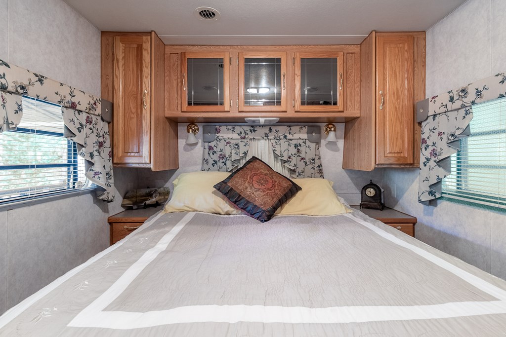 66-186 Peaceful Loop Chatsworth, GA 30705 - Photo 10 of 31 a bedroom with bed and window