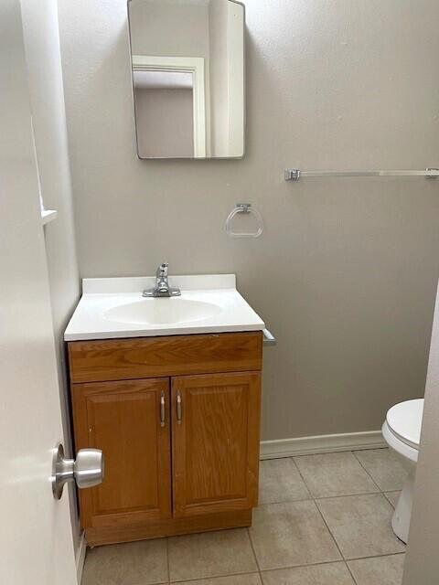 2409 Utica Avenue Lubbock, TX 79407 - Photo 13 of 22 a bathroom with a sink and a vanity