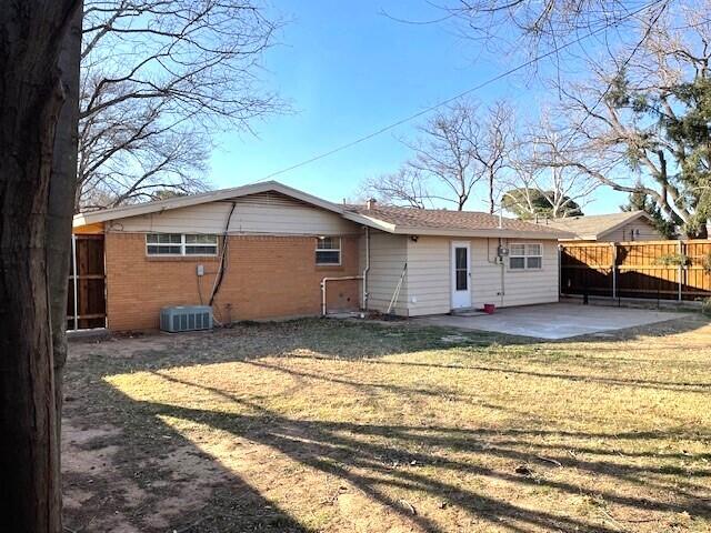 2409 Utica Avenue Lubbock, TX 79407 - Photo 19 of 22 a view of a house with a patio