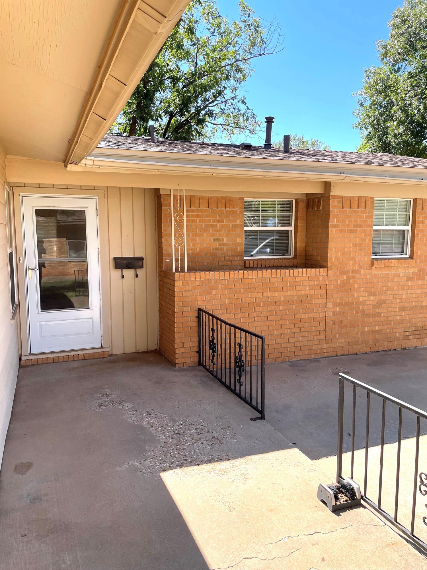 2409 Utica Avenue Lubbock, TX 79407 - Photo 2 of 22 front door and porch